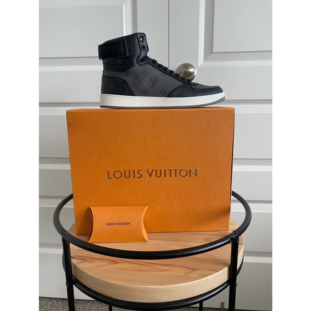 Used Louis Vuitton rivoli sneaker boot. Size 9.